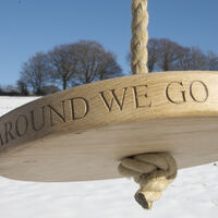 Sitting Spiritually Carved round oak swing