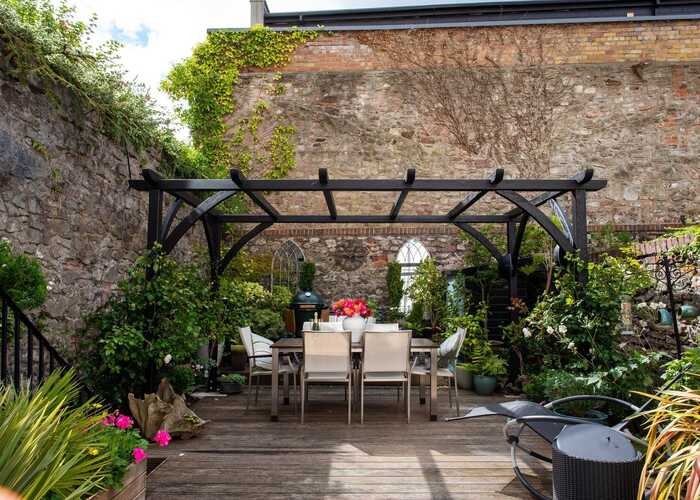 Bespoke designed black pergola Bespoke designed black pergola