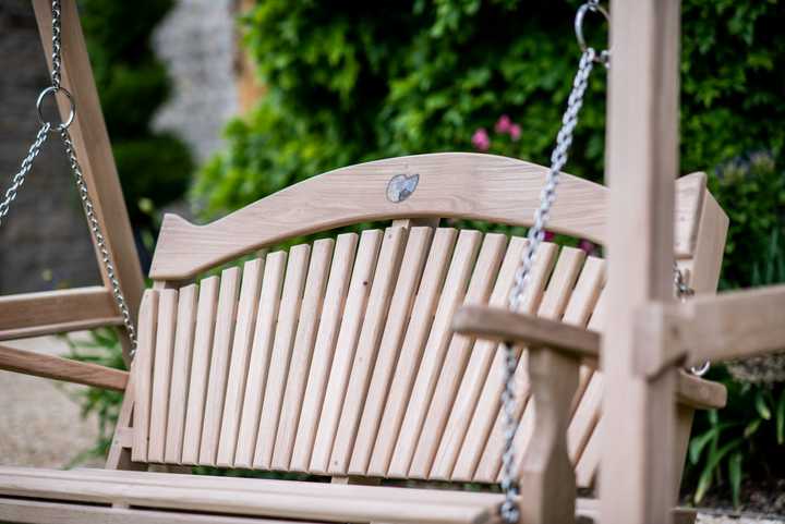 large wooden swing seat