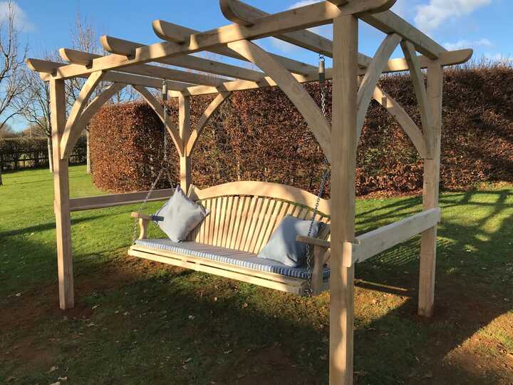 Fan-Back Tranquillity Swing Seat in Oak with Oak Pergola