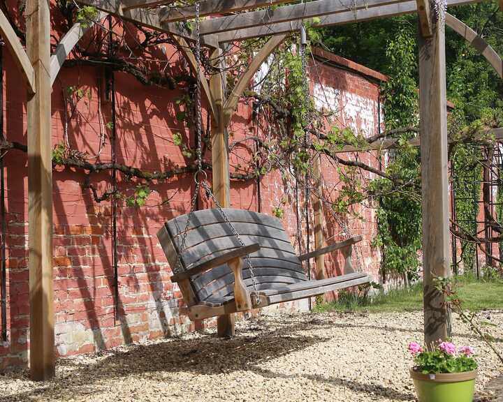 pergola with swing seat