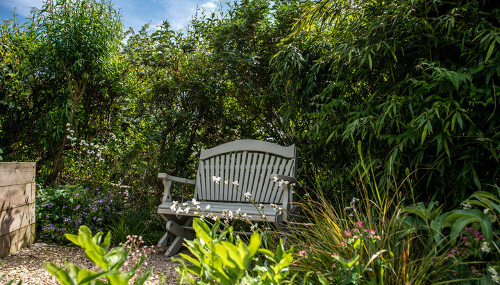 Add Relaxing Movement To Small Outdoor Spaces With A Garden Rocking Bench