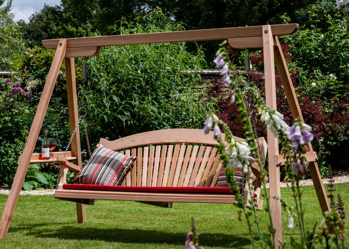 How To Incorporate a Cedar Swing Seat Into Your Garden Design