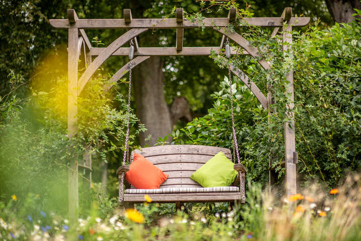 pergola with arbour swing seat