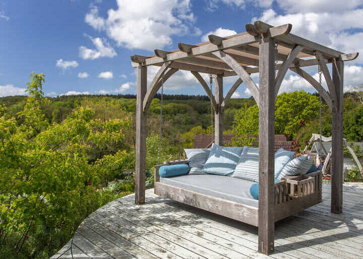 Day bed and pergola outdoors