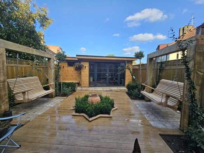 two handmade pergola arches