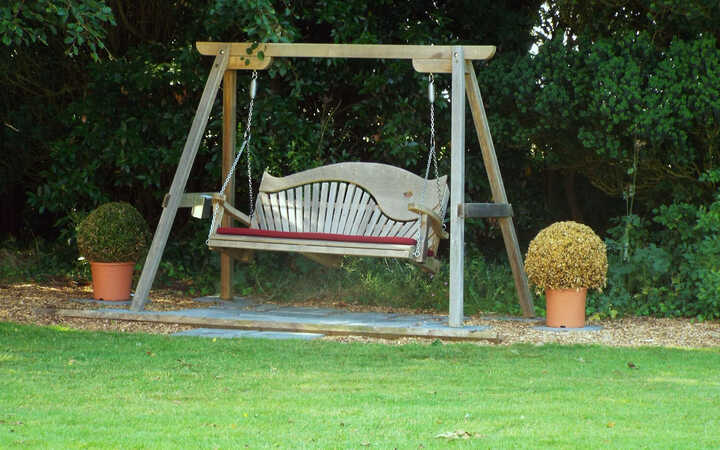 Wooden Swing Seat at The Dower House Hotel