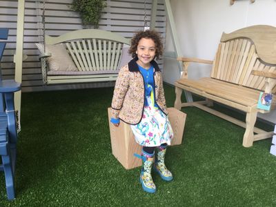 Cute Customer trying the new stools.JPG